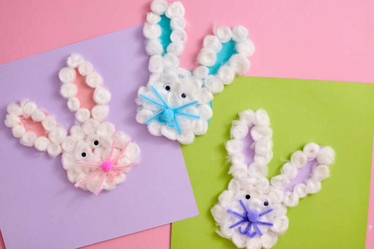 Bunny Cotton Craft trio with cotton balls, googly eyes, and colorful pipe cleaner whiskers on pastel cardstock.